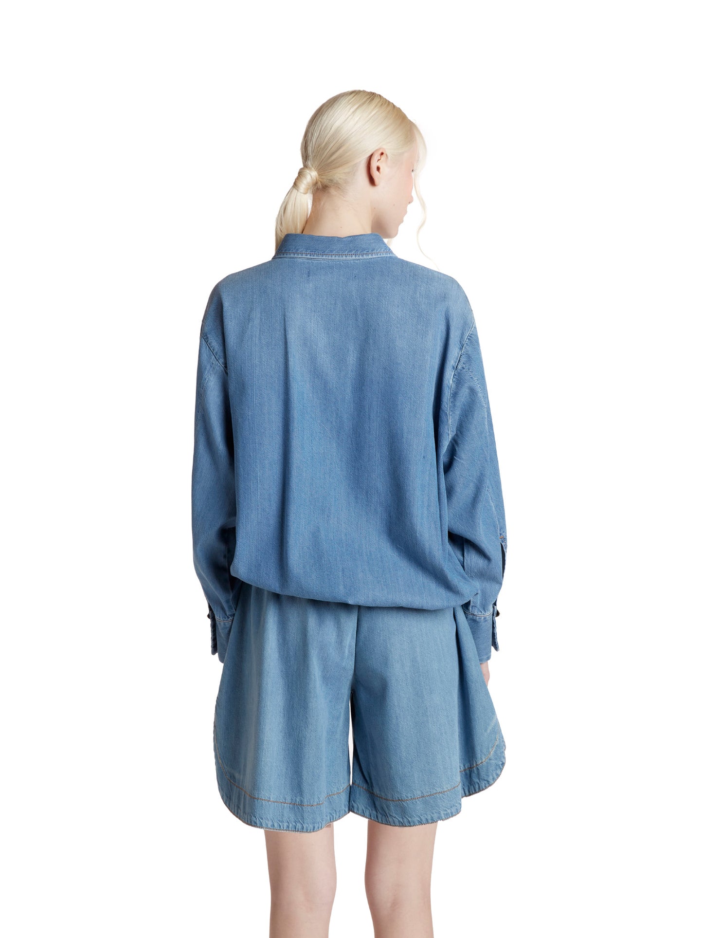 Oversized shirt with asymmetrical hem