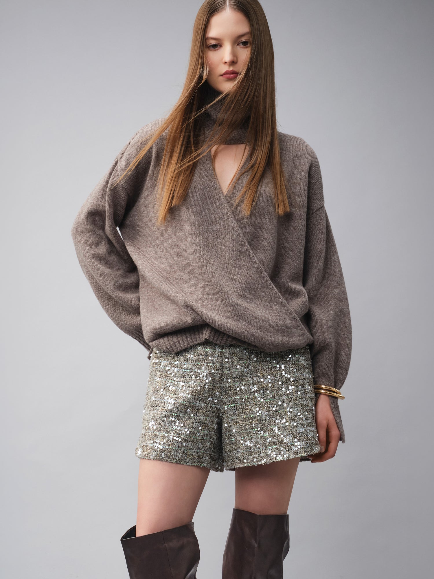 High-neck crossover turtleneck sweater with bracelet