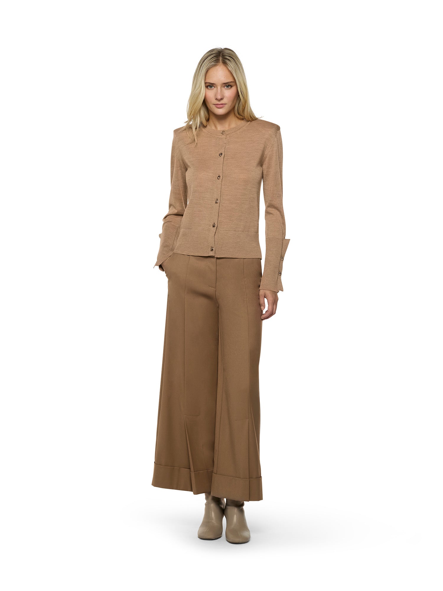 Cardigan with shoulder pads and buttoned sleeves