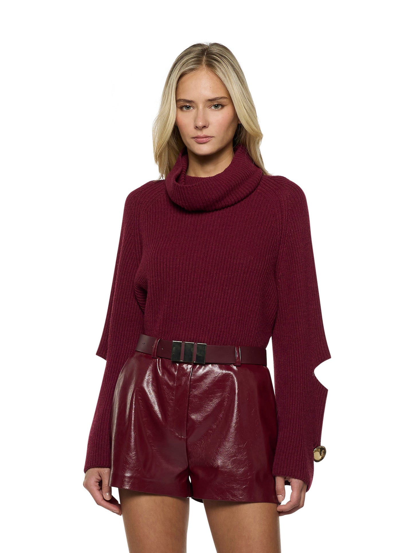 Dropped-neck sweater with openings at the elbows