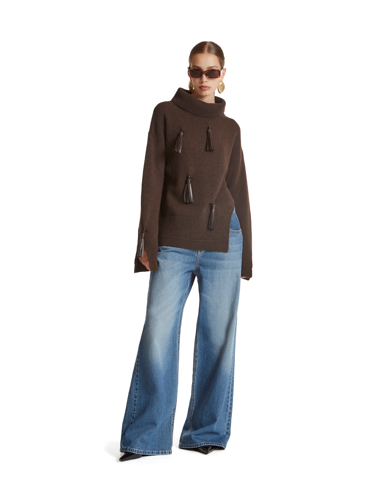 Maglione a collo alto con spacco e nappe in vegan leather