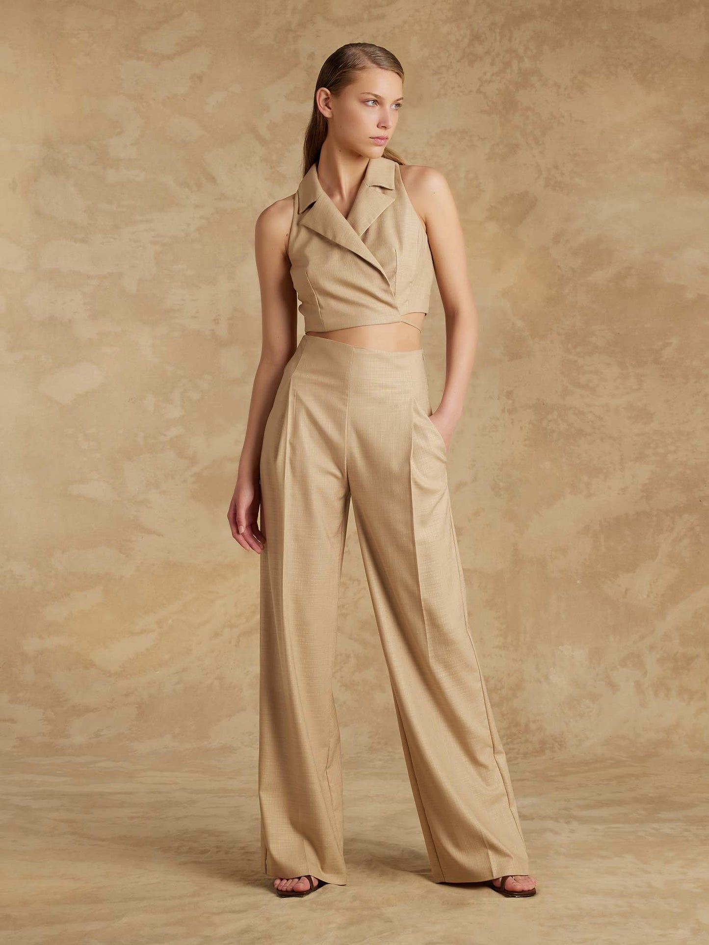 Wide trousers with slanted pockets in luxury textured fabric